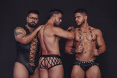 Black leather briefs with silver studs and diamond patterned lace trim featured in exploring the vibrant world of Candyman underwear