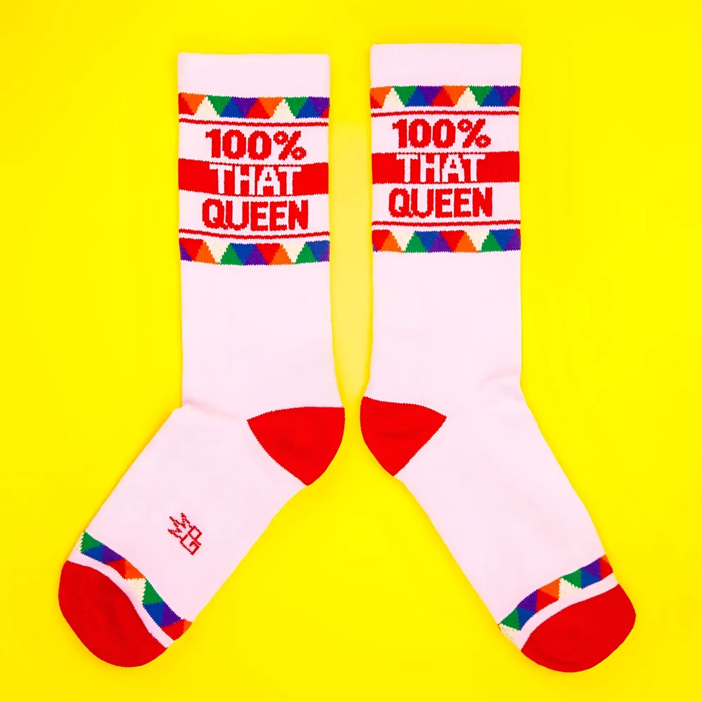 White 100 percent that queen crew socks with red toe and heel accents and colorful cuff patterns