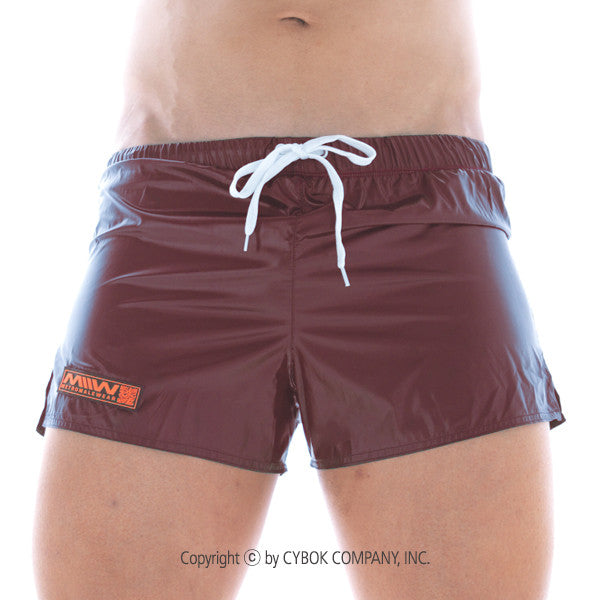 Maroon shiny iron sports short with white drawstring and small orange logo on left leg from MetroMaleWear