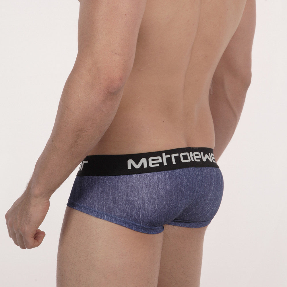Blue denim textured men’s briefs with a black waistband featuring white metroiewe branding metro malewear mini cheek boxer
