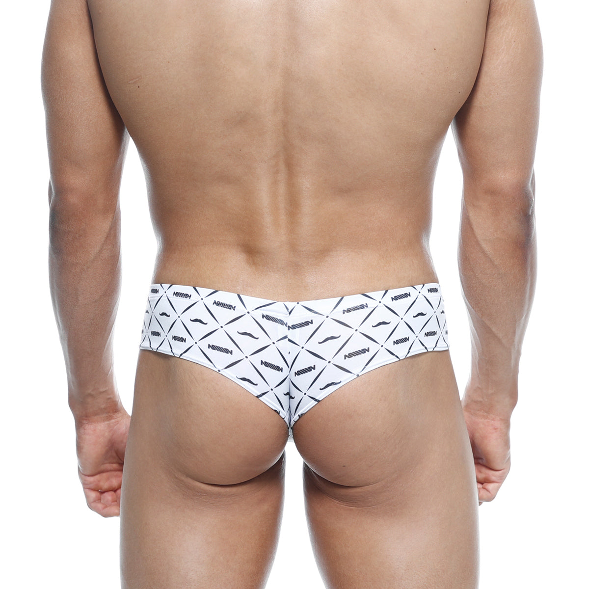 White briefs with bold black geometric and mustache pattern featuring repeated arrow branding metro malewear micro cheek caballero 2027 03