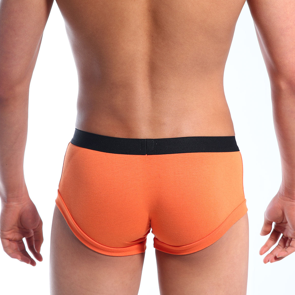 Orange briefs with a black elastic waistband from metro male wear in breathable fabric for comfortable daily use