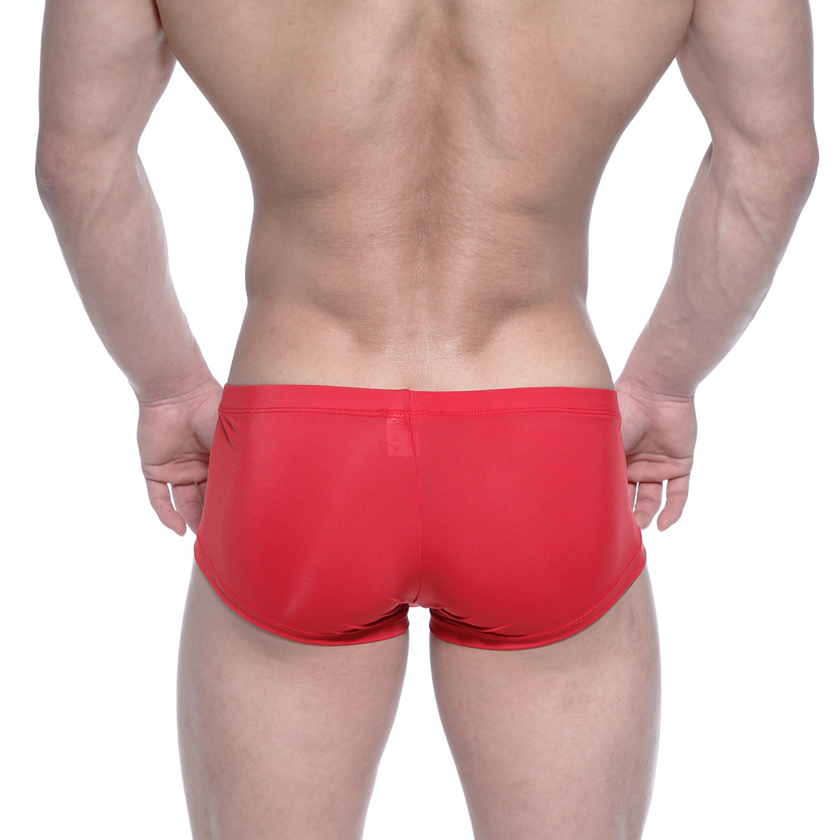 Back view of metallalewear oscar boxer red form-fitting swim trunks with smooth stretchy fabric and small back pocket