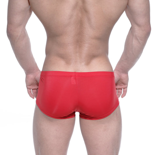 Back view of metallalewear oscar boxer red form-fitting swim trunks with smooth stretchy fabric and small back pocket
