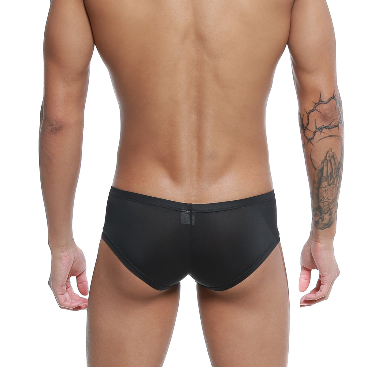 Black form-fitting swim trunks with subtle sheen and small rectangular tag on back waistband metro male wear cannon boxer