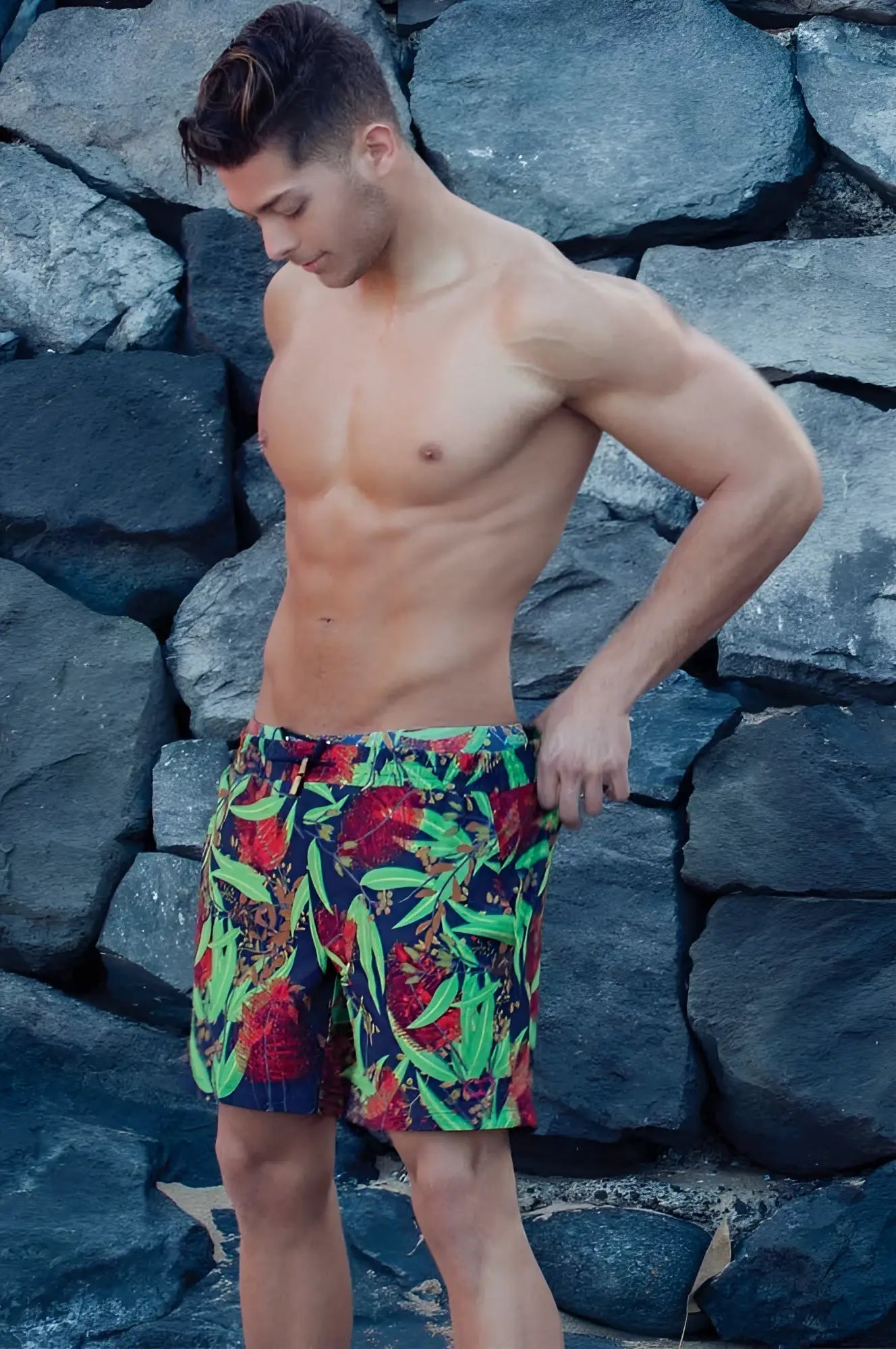 Vibrant tropical-print 2eros australiana shorts swimwear with bold red green and navy foliage patterns size xl