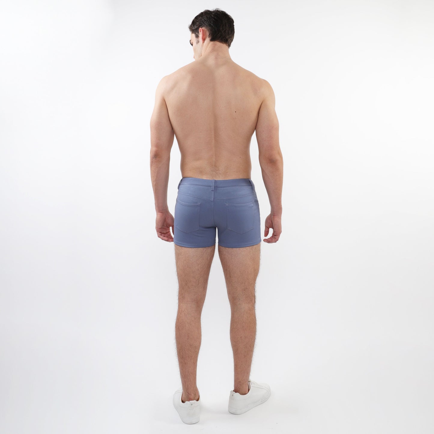 Blue denim 3 inch stretch knit shorts with classic fit and rear pockets shown from the back side