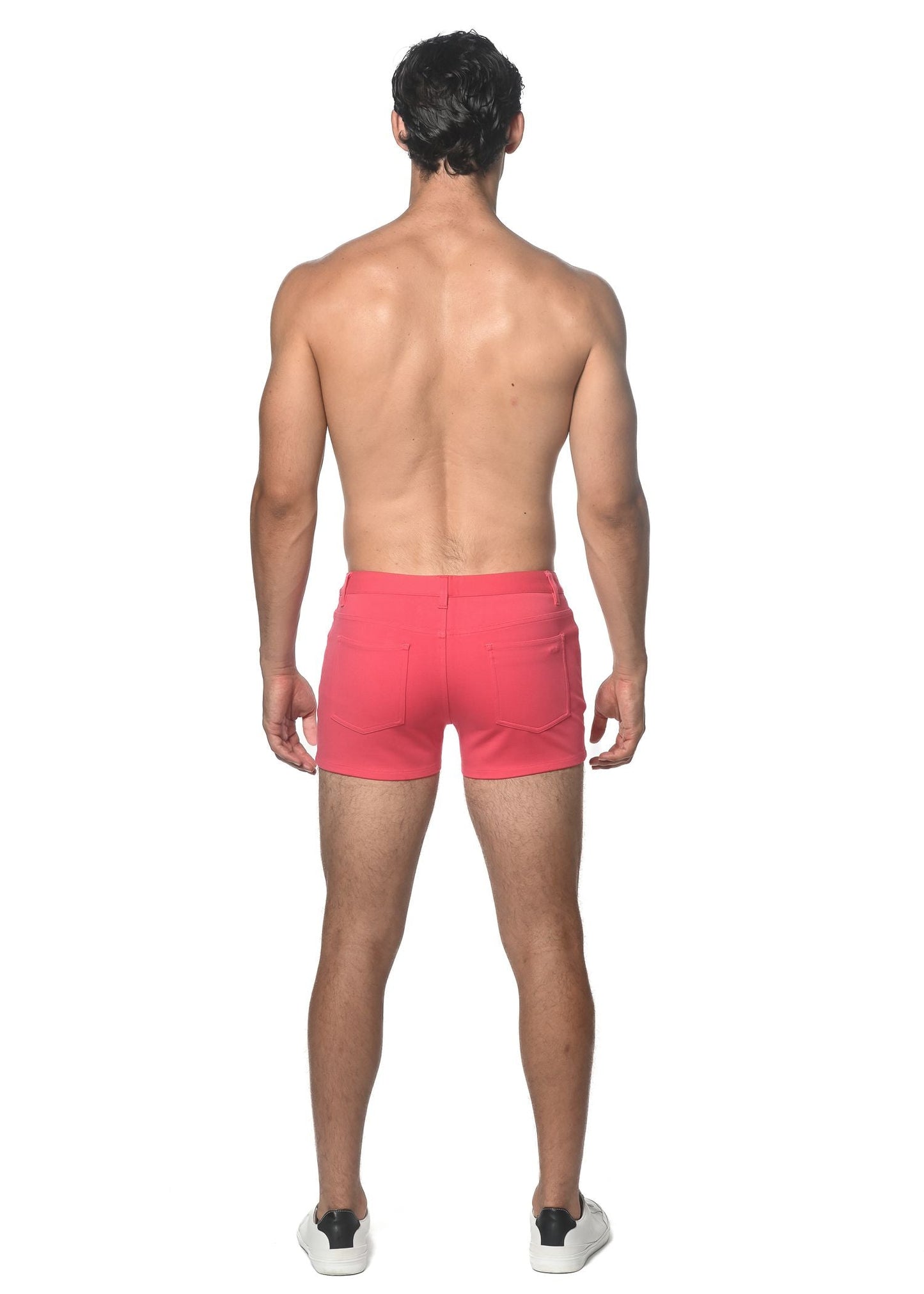 Bright pink 3 inch stretch knit athletic shorts with a modern design and subtle side pockets for active use