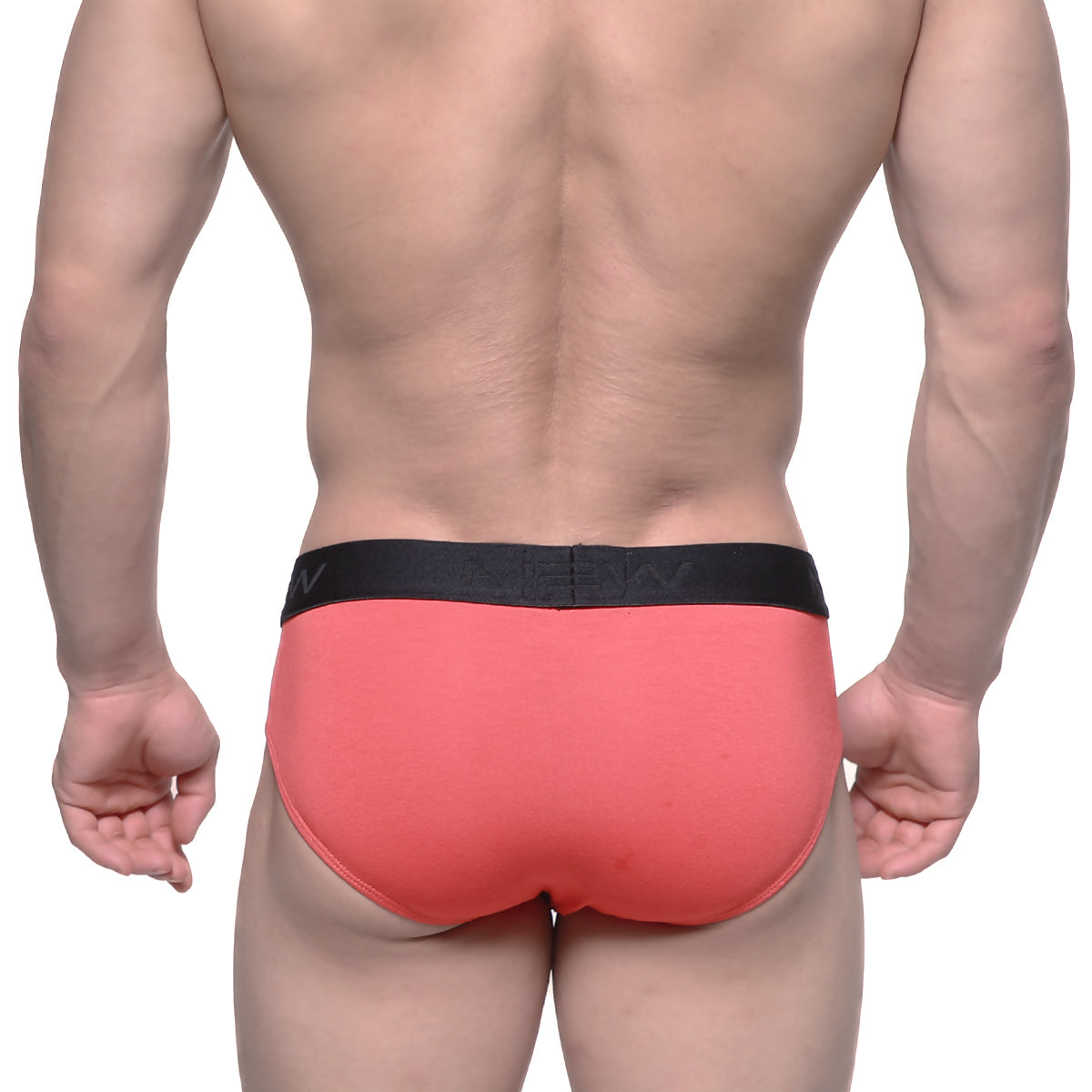 Coral-colored cotton hip briefs with a black elastic waistband from metromalewear model 3006-24