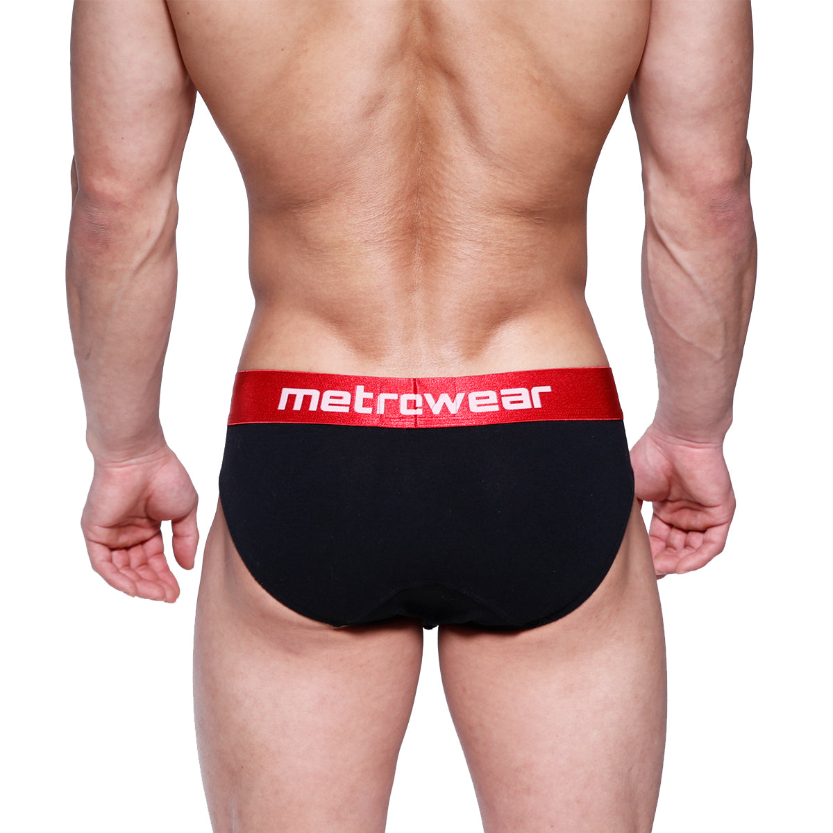 Black briefs with a red waistband featuring the metrowear logo in white from metro malewear downhole brief 3029-20