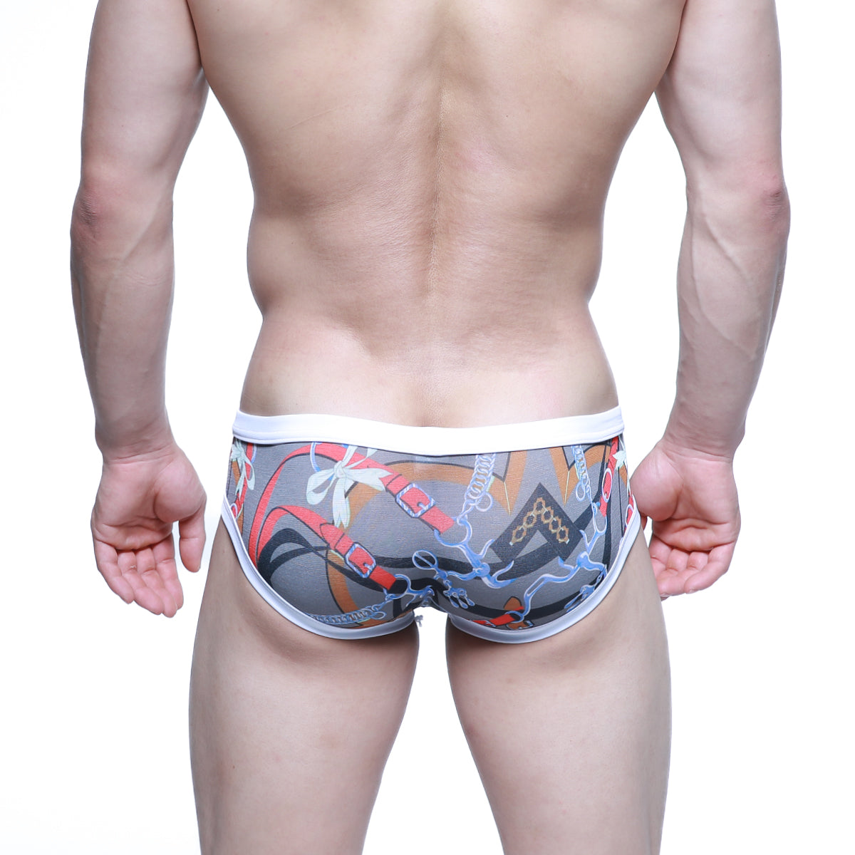 Gray swim trunks with bold red black and white chain and buckle pattern from metromalewear modern trunk line