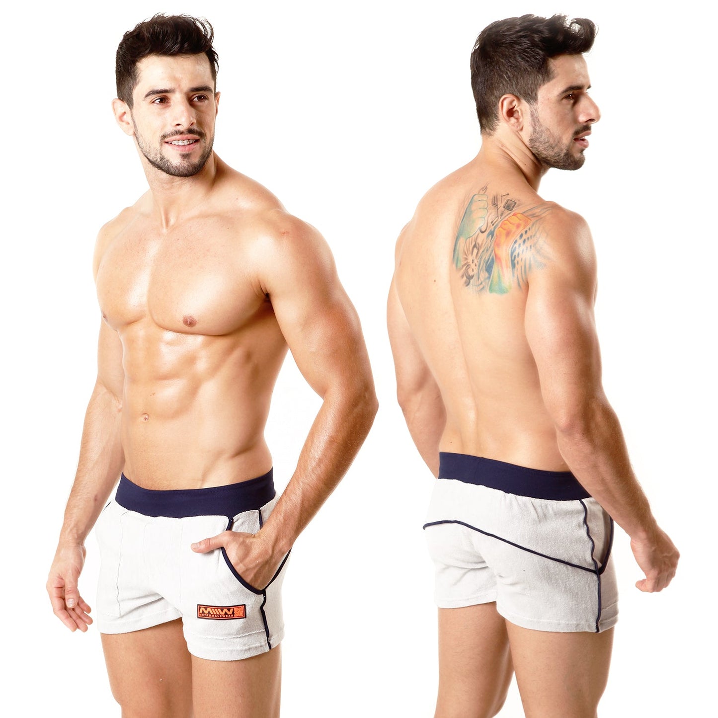White metro male wear terry sport shorts with navy waistband and trim featuring an orange logo on the left leg