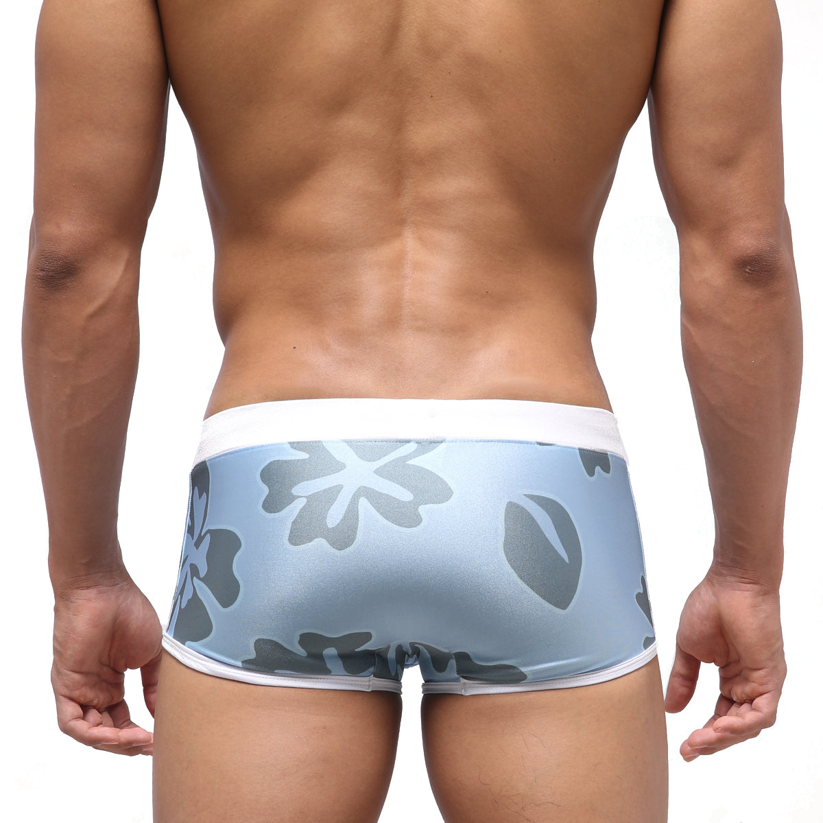 Light blue MetroMaleWear Fresco swim trunk briefs with gray floral pattern and white trim for natural comfort