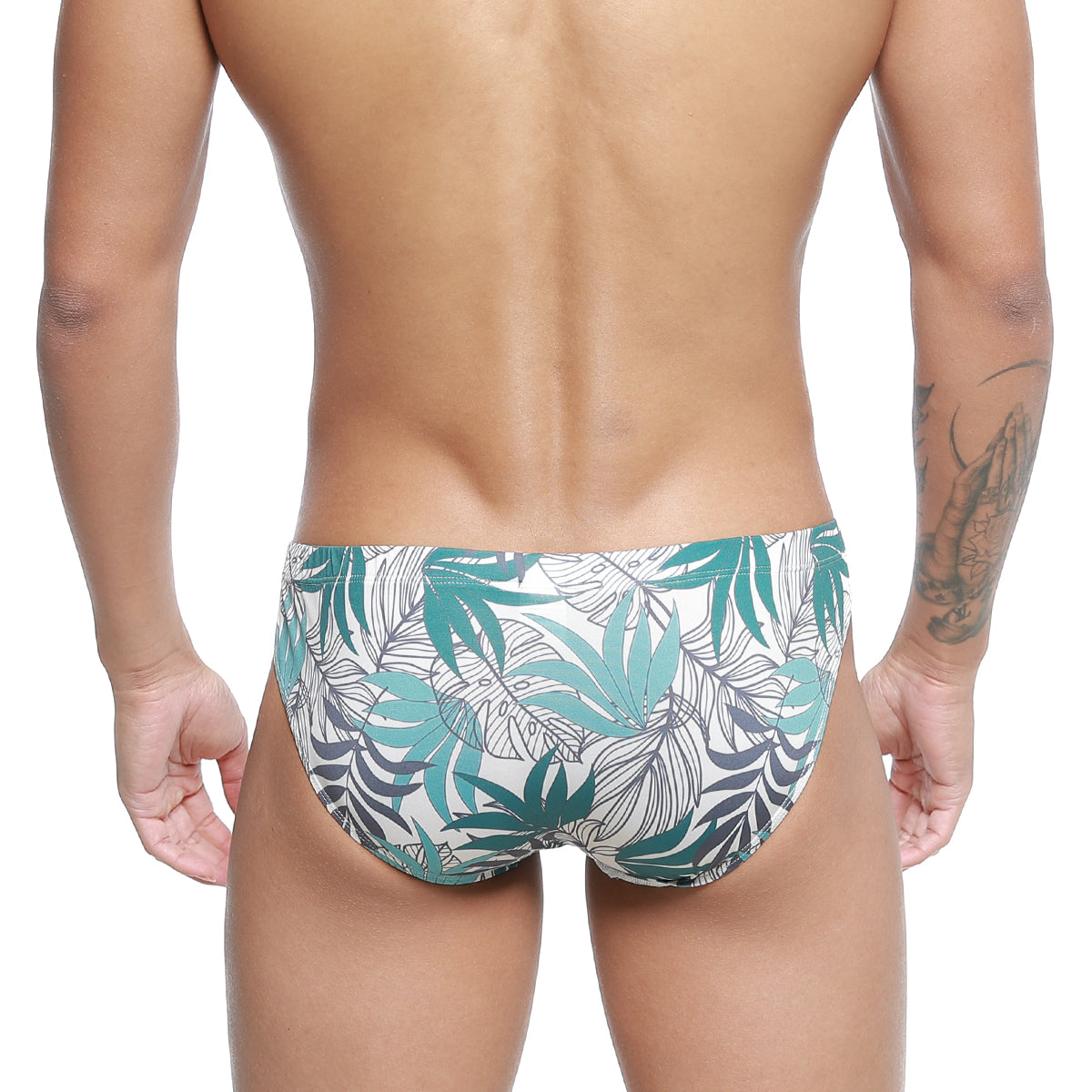 White swim trunks metro malewear meadow bikini 5103-56 with vibrant teal and dark gray tropical leaf pattern