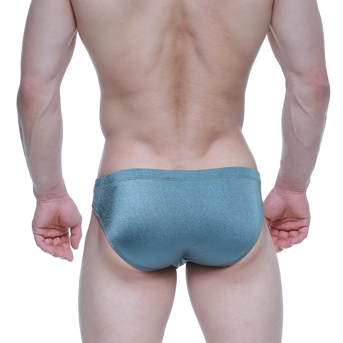 A sleek shimmering teal swim trunks with a smooth glossy finish from MetroMaleWear Forest Bikini 5103-M03