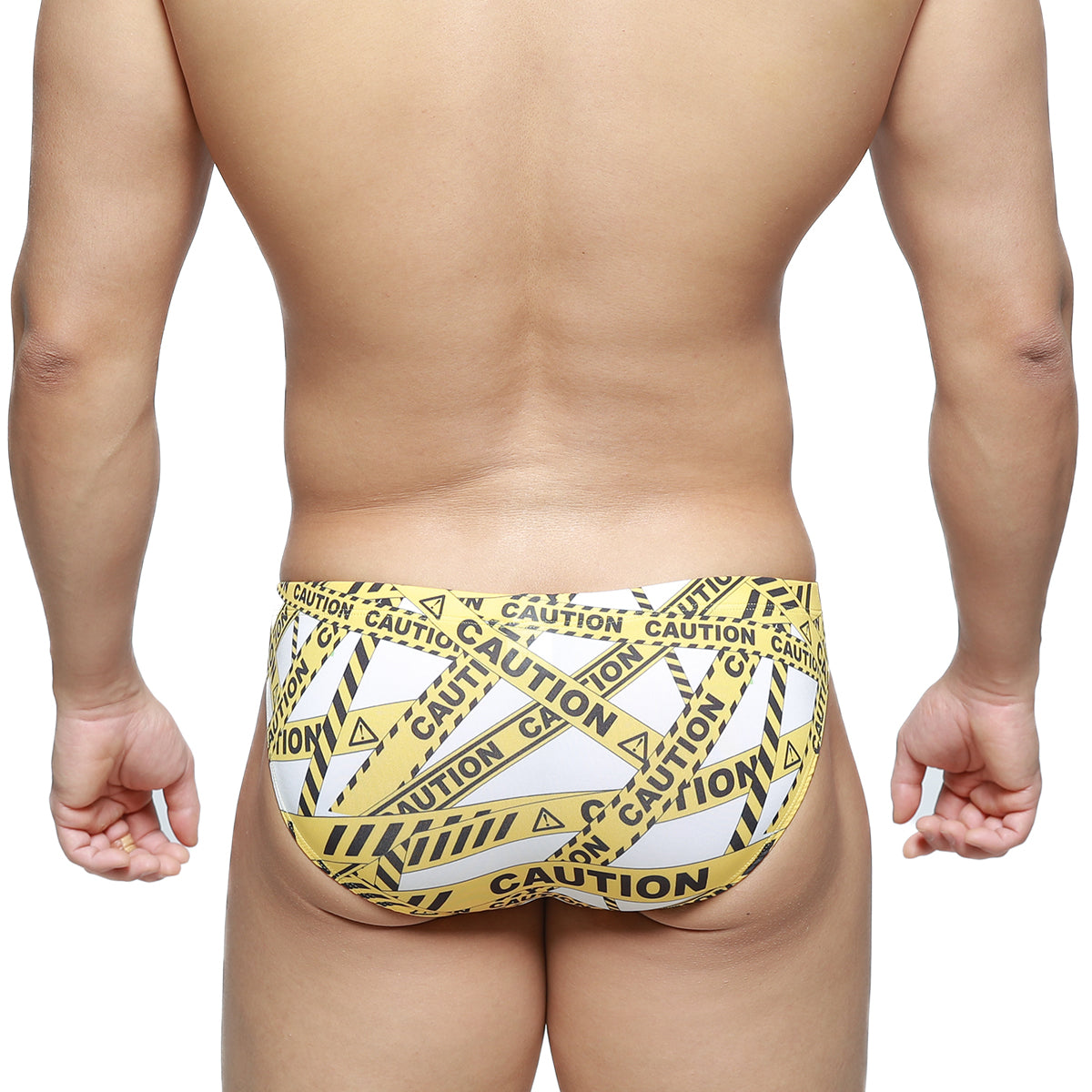 MetroMaleWear caution bikini white 5103-M60 swim trunks feature yellow and black caution tape pattern for beachwear