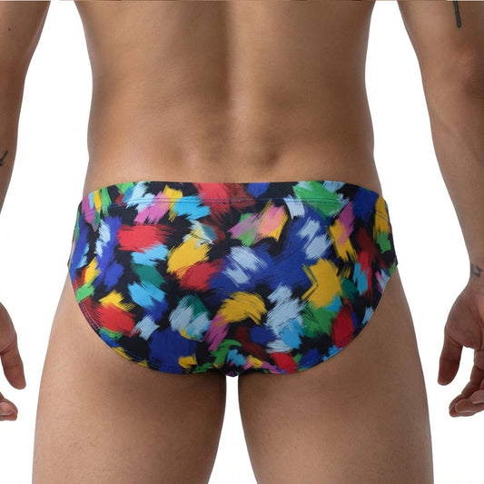 MetroMalewear primavera bikini 5103-M84 swim trunks with vibrant abstract brushstroke pattern in red blue yellow green on black