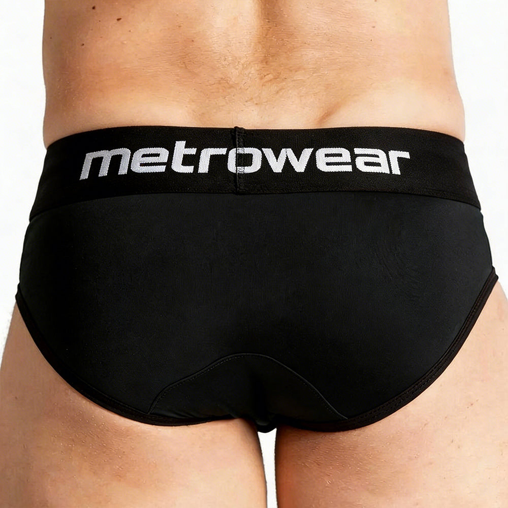 Black metrowear travis briefs with a white logo waistband offering comfortable everyday wear