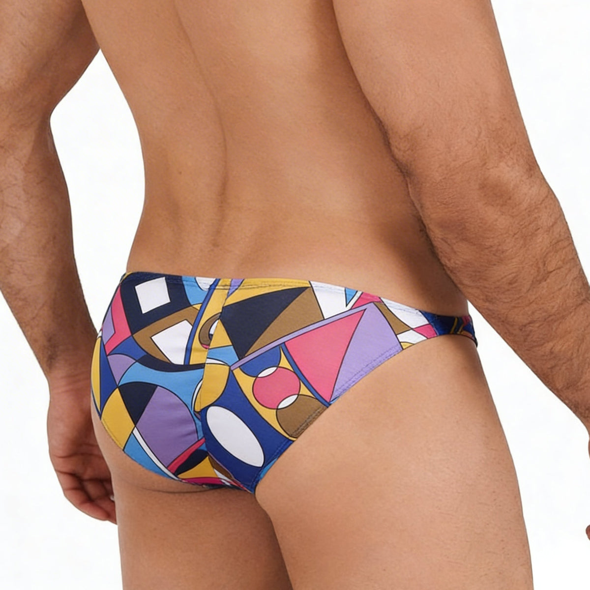 MetroMalewear fantasy bikini picasso 6116-87 swim trunks with vibrant geometric pattern in bold blues yellows pinks and purples