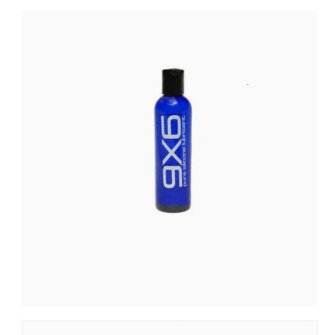 Blue axe body wash bottle with black cap and white lettering featured in 9x6 lube product image