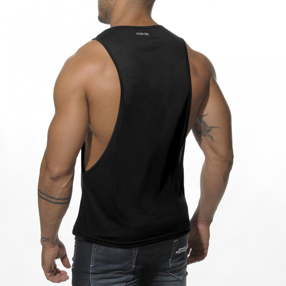 Black sleeveless adidted tank top with cutout back showcasing ad logo low rider design at the neckline