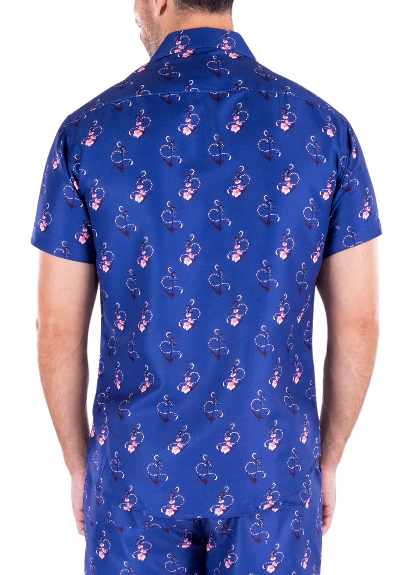 Blue short-sleeved button-up anchoring in hawaii s s shirt with pink and white abstract figure pattern