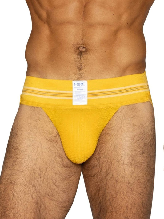 Bright yellow bike athletic briefs with white stripes and brand label designed for sports and active wear