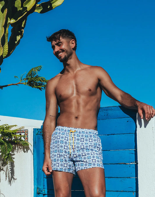 Byron swim short mykonos print white swim trunks with blue geometric pattern and yellow drawstring for beachwear