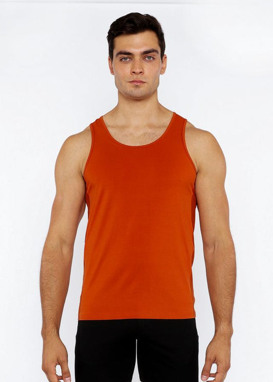 A solid orange sleeveless stretch jersey tank top with circle spine laser cut and a simple round neckline