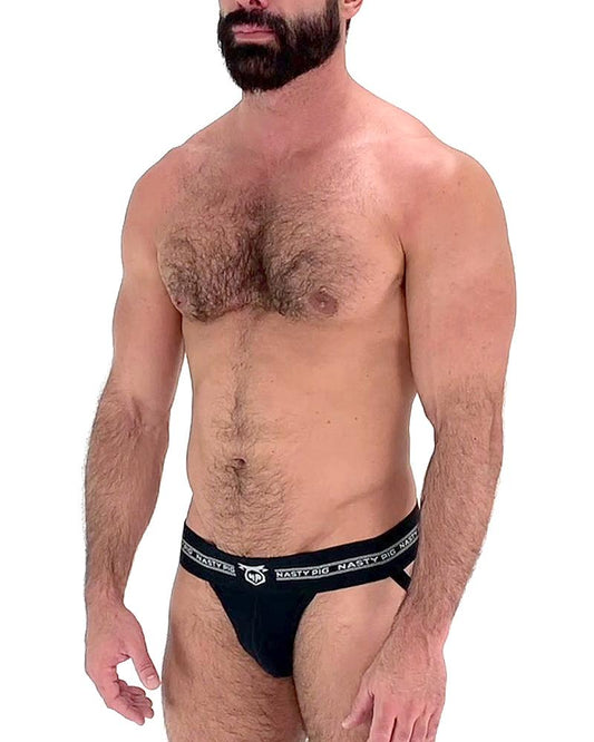 Black core jockstrap briefs with a white logo waistband featuring a nasty pig brand design