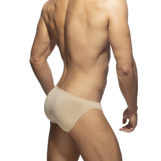 Beige cotton bikini brief with a smooth seamless design and form-fitting fit for comfortable everyday wear
