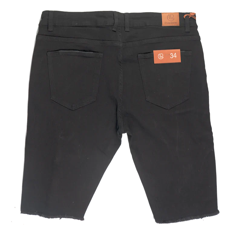 Back view of crysp denim cut off short black slim fit denim shorts with two back pockets and orange brand tags