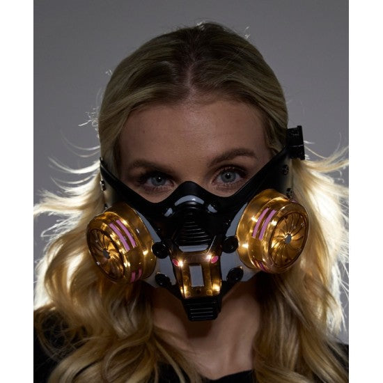 Cyberpunk light up mask black gas mask with gold filters and pink accents designed for futuristic style use