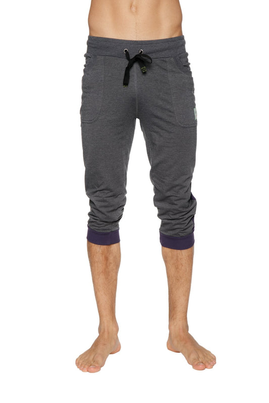 Cuffed yoga pants in charcoal with eggplant featuring dark gray heathered fabric navy ribbed cuffs and black drawstring waistband