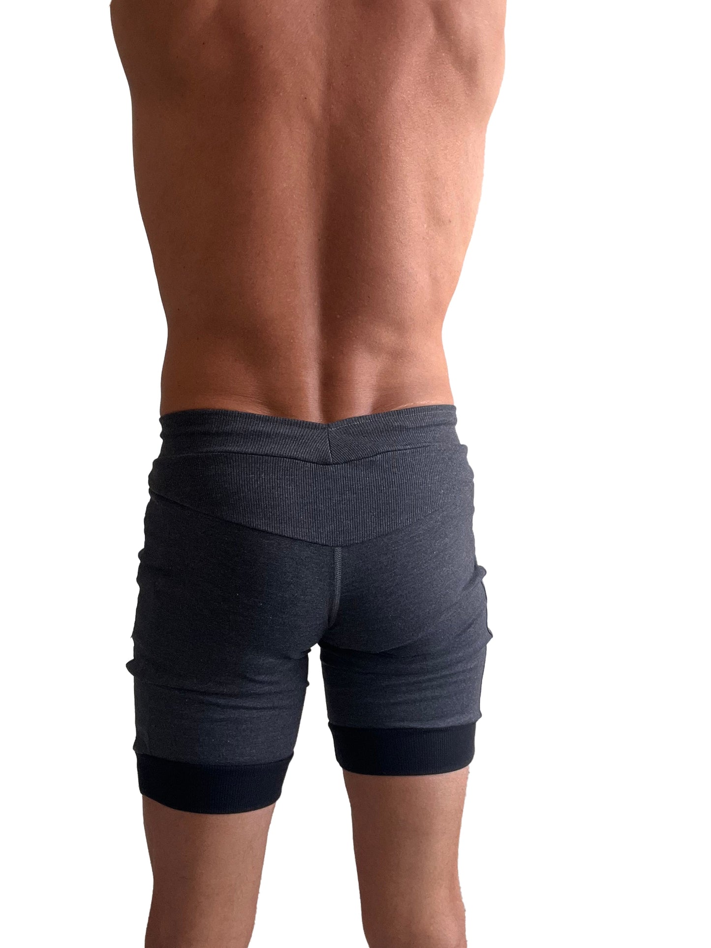 Dark gray ribbed cuffed yoga shorts with contrasting black waistband and hem in charcoal with black cuff