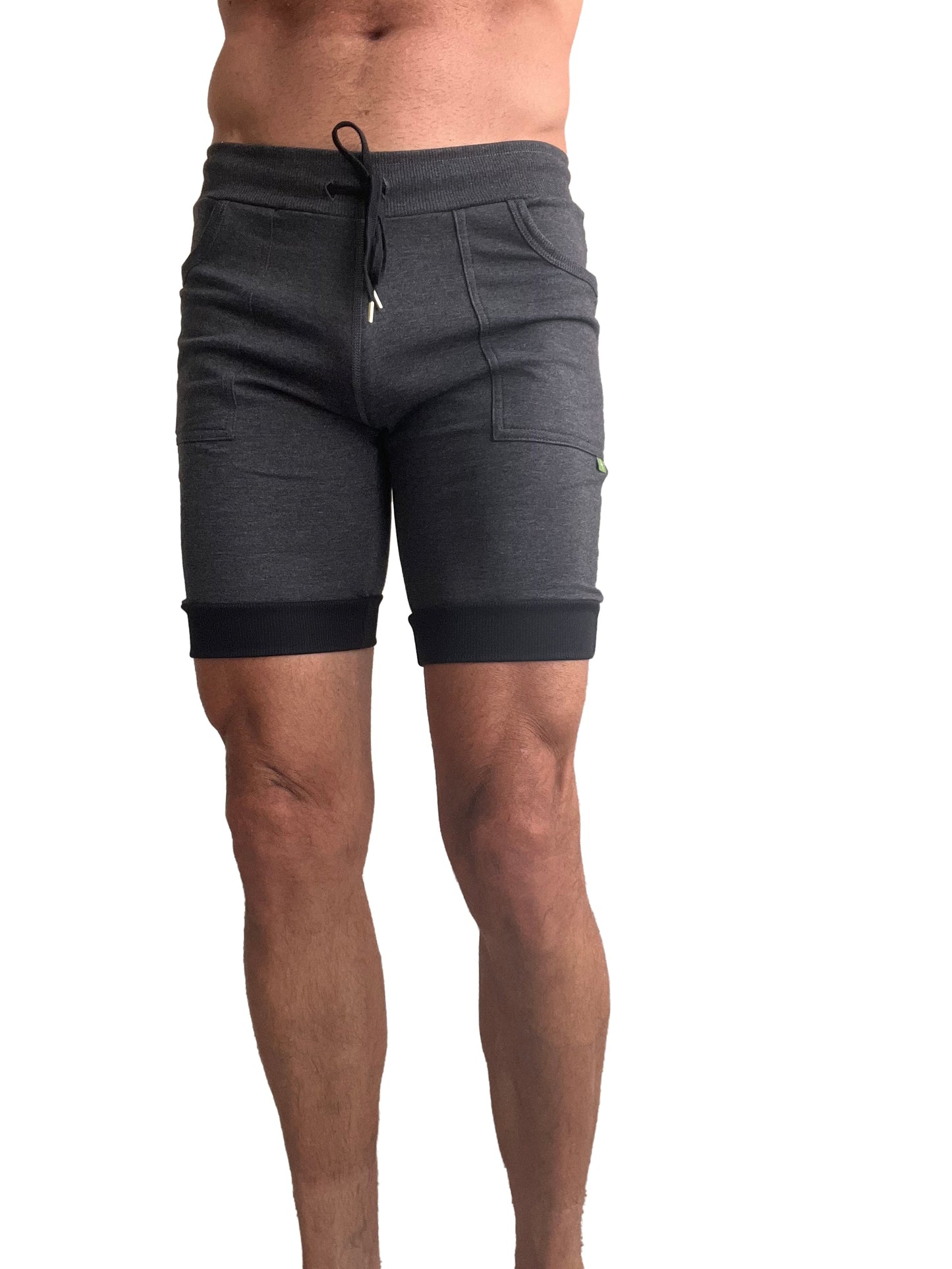 Dark gray cuffed yoga shorts with drawstring waistband and black elastic cuffs for athletic use