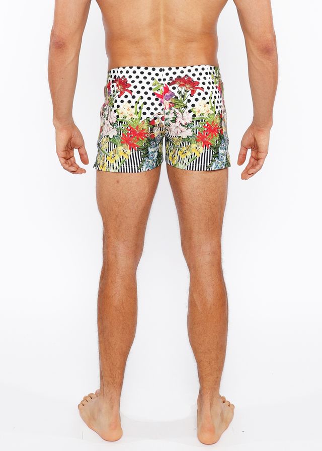 Dots abstract printed swim short featuring vibrant floral and polka-dot patterns with red pink green and yellow blossoms