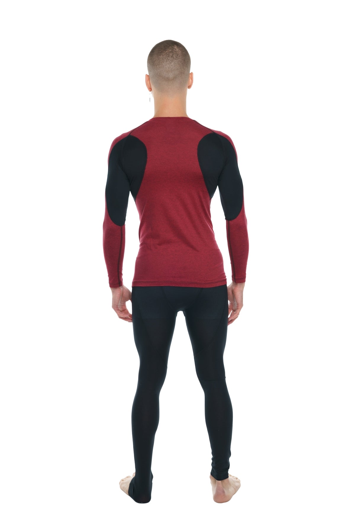 Designer raglan crew-neck long sleeve tee in brick red with black accent and contrasting shoulder panels for athletic wear