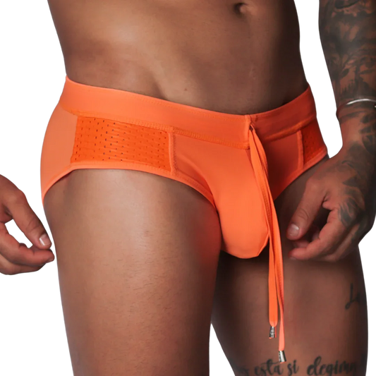 Bright orange swim brief with mesh side panels, an elastic waistband, and a decorative front drawstring tie.