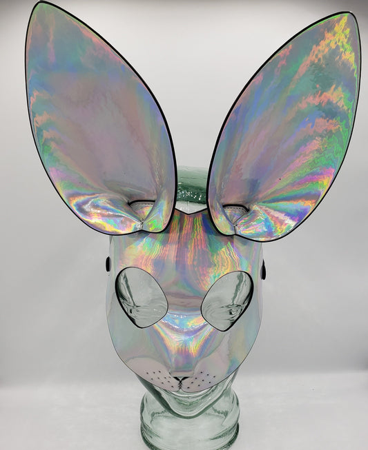 Exotic bunny mask with iridescent holographic reflective surface and oversized ears in a vibrant colorful finish