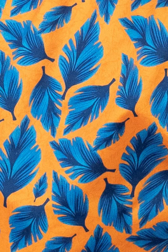 Feather print swim short with vibrant blue feather pattern on warm orange fabric for stylish beachwear