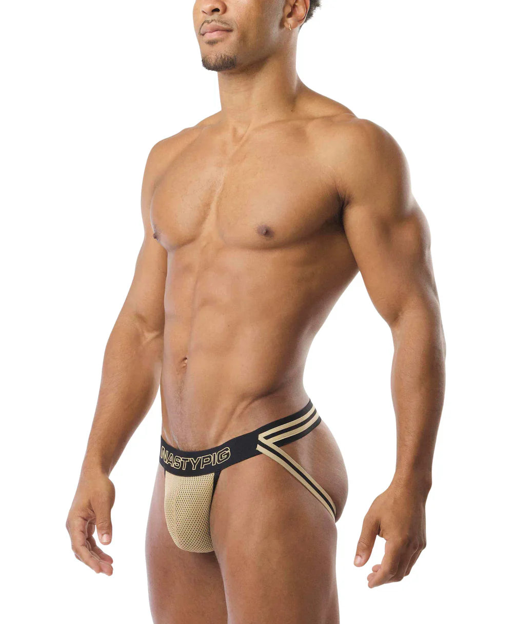 Beige mesh athletic briefs with black elastic waistband gold trim and mastypic branding in flip it jockstrap style