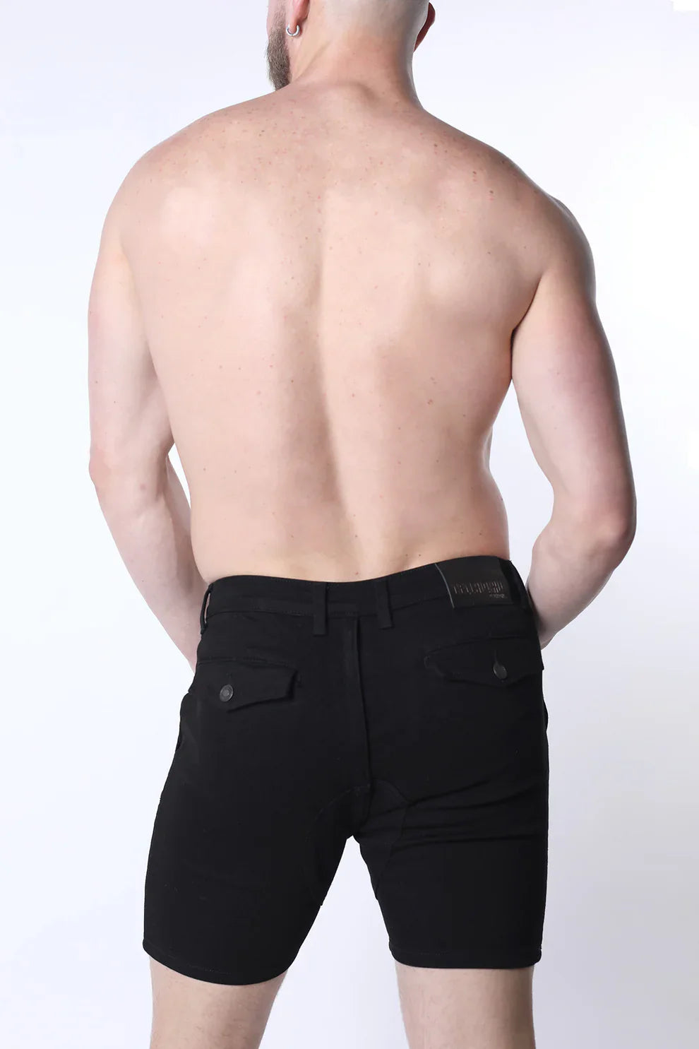 Black denim zipper shorts with sleek modern cut and subtle stitching details in full court denim zipper short