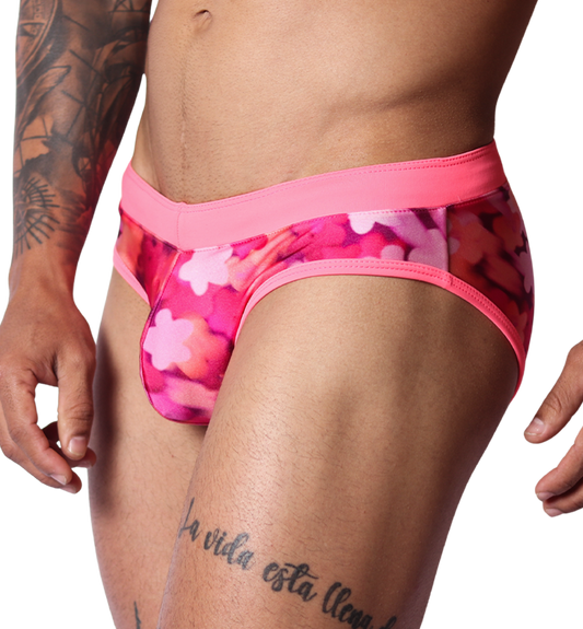 Gigo fuchsia floral print swim brief, side view. Smooth fabric with bright pink waistband and contrast trim.