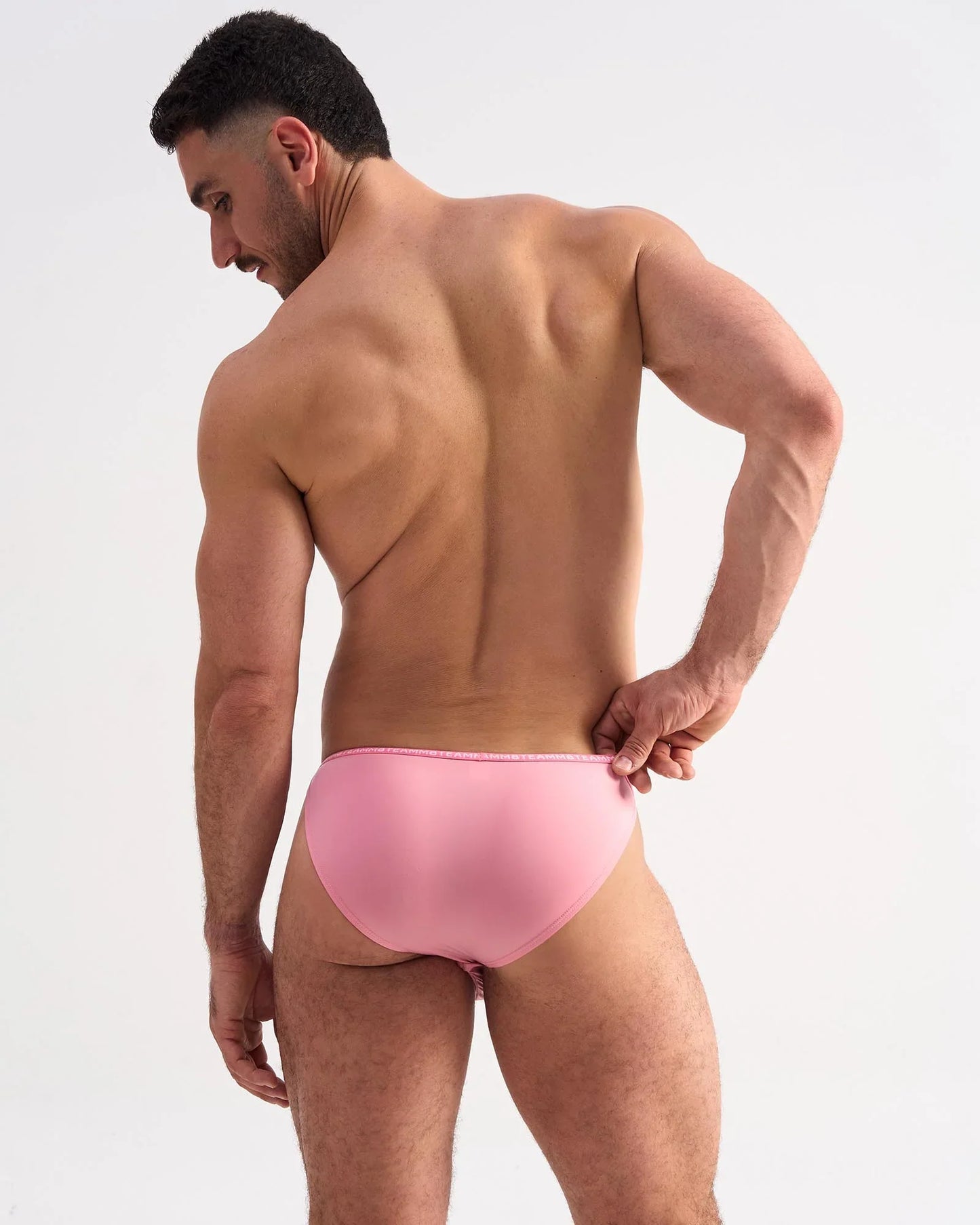 A sleek glide micro brief in solid pink with a smooth fabric finish for comfortable everyday wear