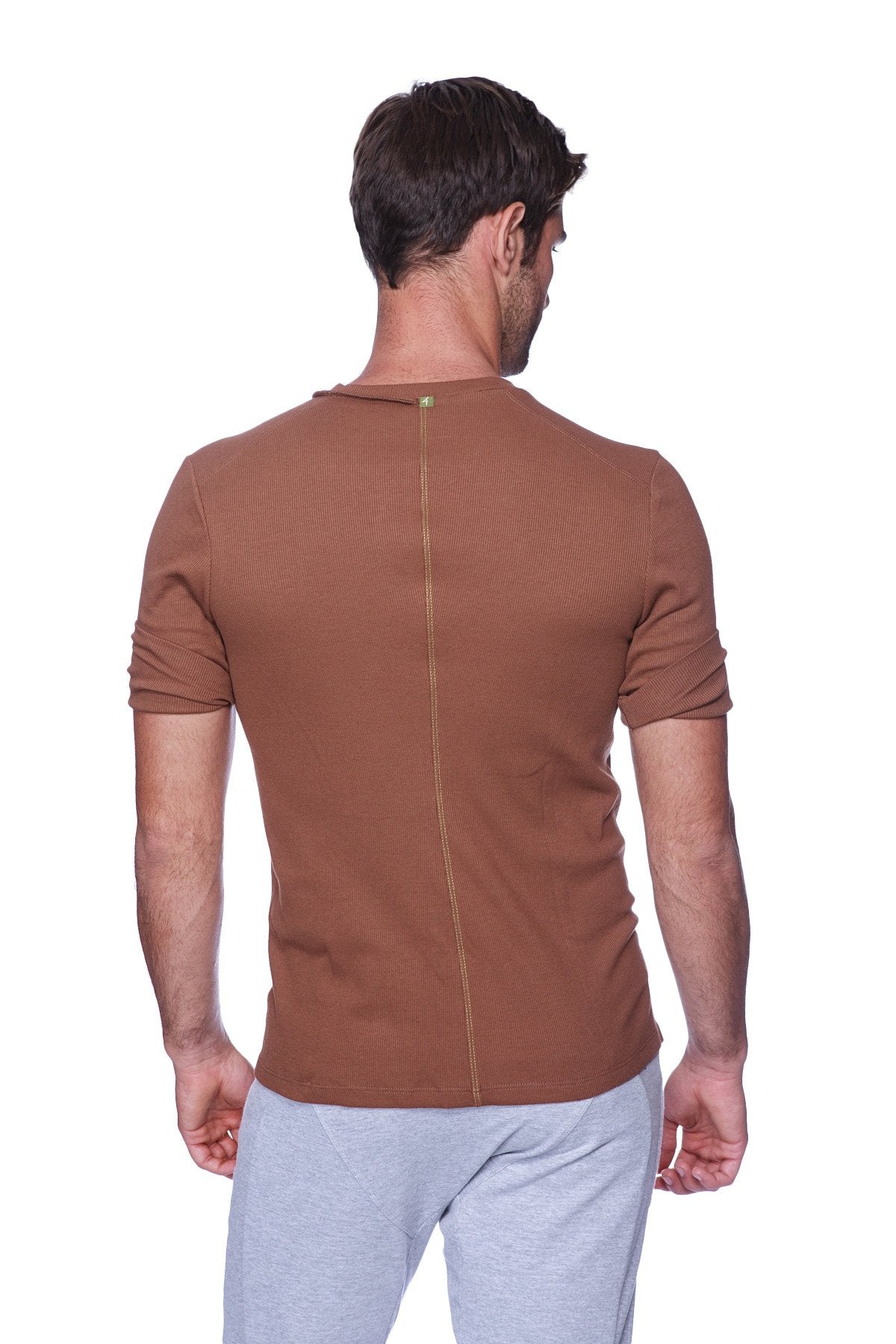 Brown ribbed short-sleeve hybrid v-neck t-shirt with central back zipper detail in chocolate color shown from back