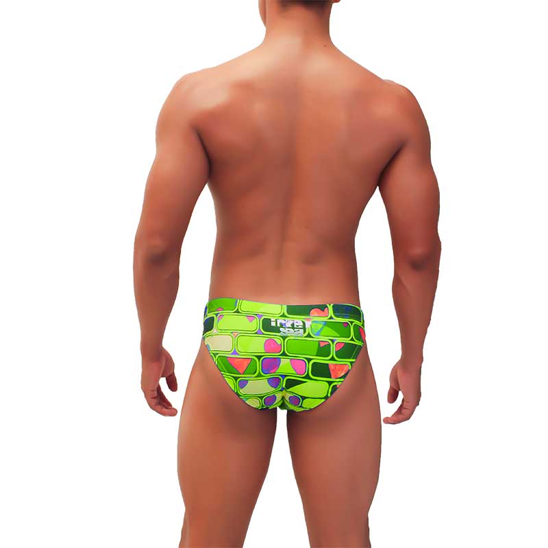 Icker Sea Bricks bikini swimwear green vibrant lime green swim trunks with bold geometric pink purple and teal accents