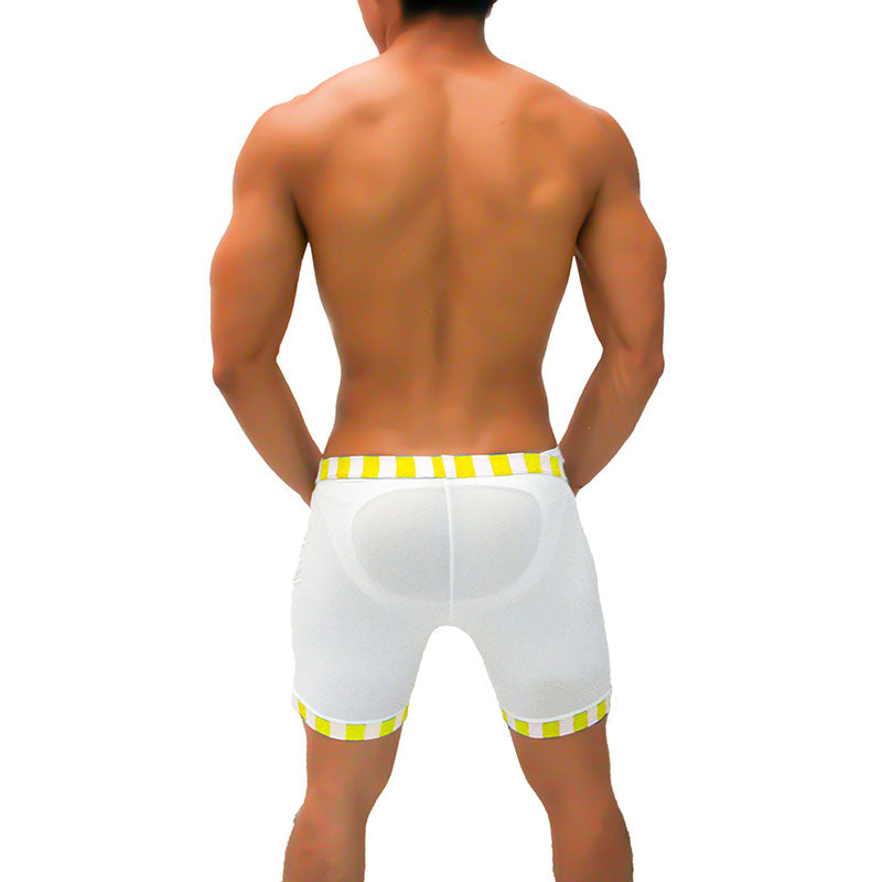 White athletic shorts with yellow and white striped waistband and hem translucent material and padded back panel