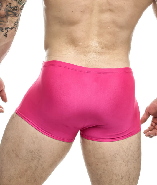 Bright pink form-fitting swim trunks with smooth stretchy fabric from justin + simon classic boxer final sale collection