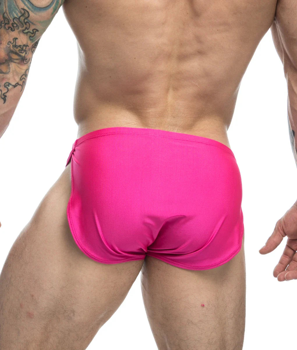 Vibrant fuchsia justin + simon running short final sale with satin finish and snug fit swim trunks front view